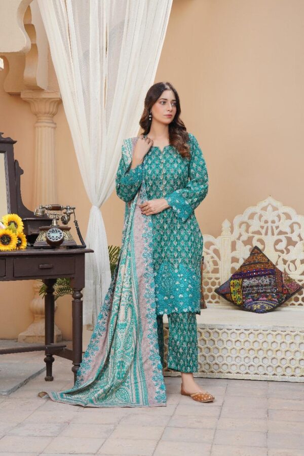Stunning 3 Pcs  embroidered khaddar suit in blue with cut work design